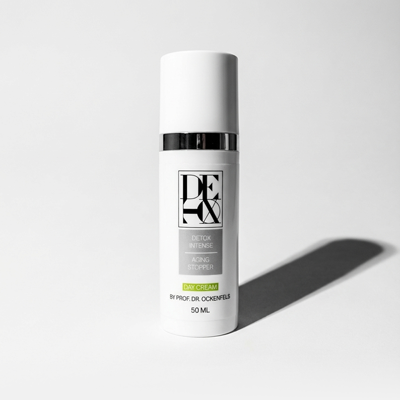 Close-up of a single green leaf against a white background.